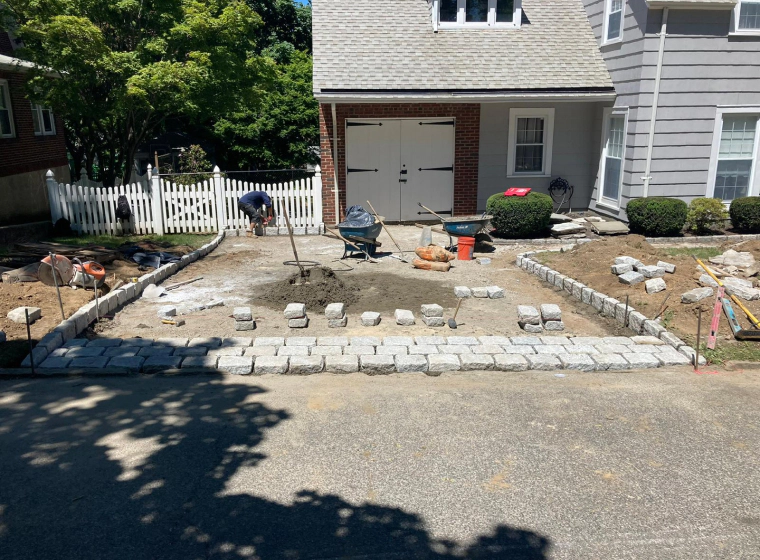 contractors working on a hardscaping project piscataway nj